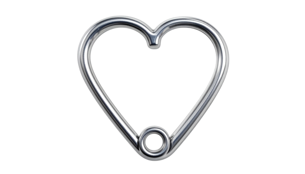 Chrome heart safety pin; rounded, shiny, metallic surface against a dark background. Soft gradient lighting effect