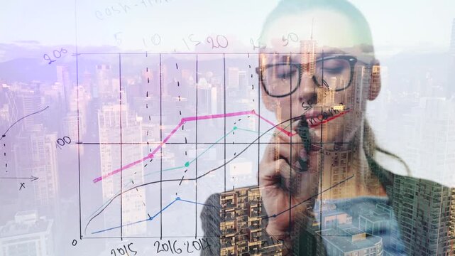 Double exposure of a business woman draws various growth charts