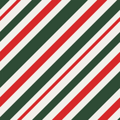 Bold diagonal stripe pattern in vibrant red, crisp white, and deep green, retro Christmas or festive theme, seamless repeat for textiles and wrapping paper.