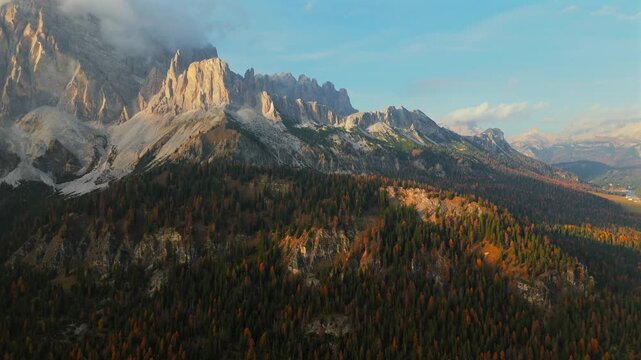 Beautiful autumn in Dolomites, Italy. Aerial view of high mountain range