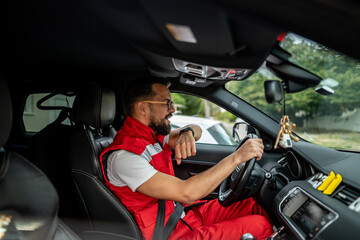 Paramedic man driving emergency vehicle working as first responder