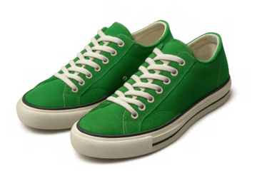 Pair of green canvas sneakers with white laces, offering casual style and comfort, isolated on transparent background