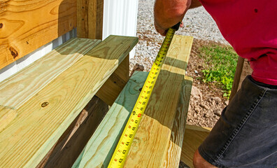 Tap measure used to build new wood steps