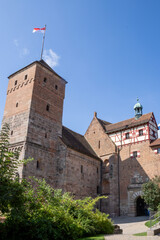 Majestic Kaiserburg N&uuml;rnberg in Germany, featuring 11th-century castles, royal palace, gardens, Sinwellturm tower, and panoramic city views, perfect for travel and history content.