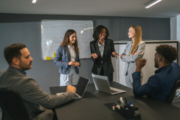 Business team collaborating during a corporate meeting in office