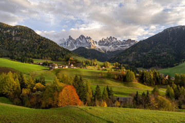 Santa Maddalena and the Odle Group in autumn during sunset, Funes Valley (Val di Funes), Trentino...