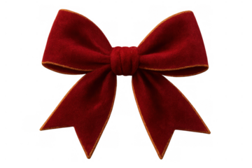 Red velvet bow with gold trim, a festive gift wrapping decoration for holidays and celebrations