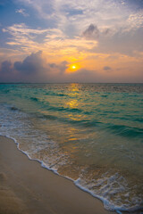 Beautiful sunset. Summer vacation, holiday amazing nature. Relax paradise, Maldives. Tropical island beach landscape exotic shore coast. Tranquil closeup calm sea water waves with palm trees. 
