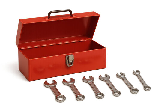 Empty red metal toolbox with wrenches and spanners. Tools for home repair, diy, and mechanic work concept