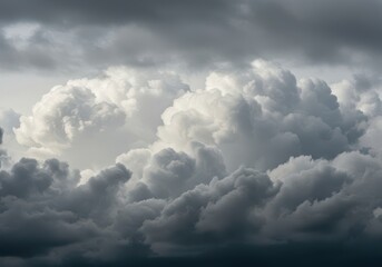 Fototapeta premium Vast expanse of thick, dense cumulonimbus clouds forming an overwhelming gray backdrop, suggesting coming rain or stormy weather ,high ,winter ,ceiling