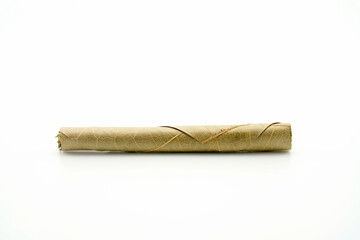 blunt cigar that has nature leaf and filled with cannabis. blunt marijuana tobacco leaf joint, marijuana blunt cigar, cannabis blunt cigarette prerolled Stick real photo white background