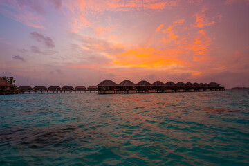 Beautiful sunset. Summer vacation, holiday amazing nature. Relax paradise, Maldives. Tropical island beach landscape exotic shore coast. Tranquil closeup calm sea water waves.