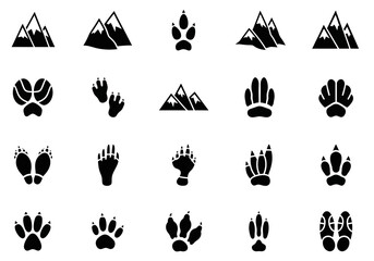 A comprehensive set of black silhouette icons featuring mountain ranges and various animal tracks. Vector illustrations of wildlife footprints and nature peaks for design