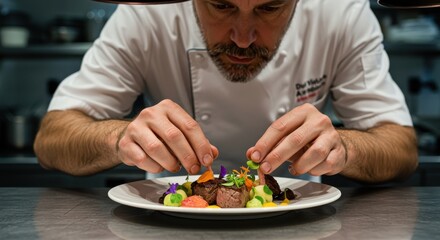 Professional chef meticulously arranges edible garnishes onto a prepared main course dish