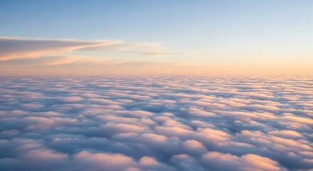 Vast Ocean of Clouds During Sunrise from Above Airplane	