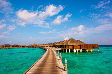 Wooden pathway to bungalows. Summer vacation, holiday amazing nature. Relax paradise, Maldives. Tropical island beach landscape exotic shore coast. Tranquil closeup calm sea water waves.