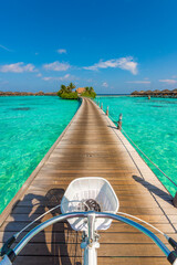 Bicycle basket in the frame. Tropical island beach landscape exotic shore coast. Tranquil closeup calm sea water waves. Summer vacation, holiday amazing nature. Relax paradise, Maldives.