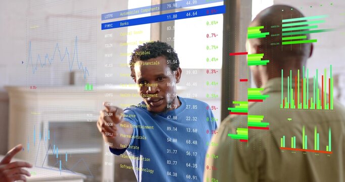 Pointing finance analyst wearing blue shirt presenting charts on digital display in meeting room