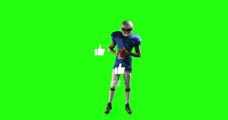 Holding football, helmeted player wearing blue jersey with pads posing in green studio, like icons
