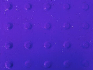 Violet abstract background with convex dots.