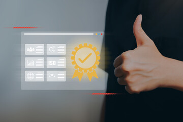 Quality management concept. Business person giving thumbs up with digital ISO certification and quality assurance icons, representing approval, trust, and professional standard.