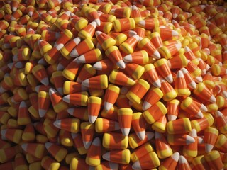A close up view of a large pile of colorful candy corn