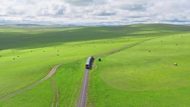 A small train on the grasslands of Inner Mongolia Scenic Area