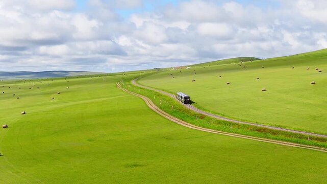 A small train on the grasslands of Inner Mongolia Scenic Area