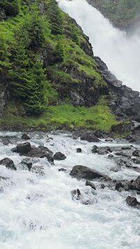 The famous Latefossen waterfall in Norway. Vertical video.