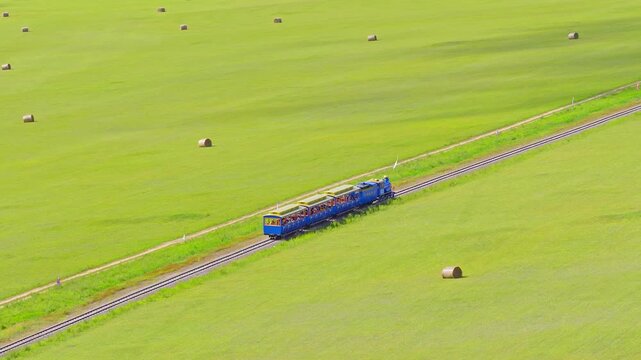 A small train on the grasslands of Inner Mongolia Scenic Area