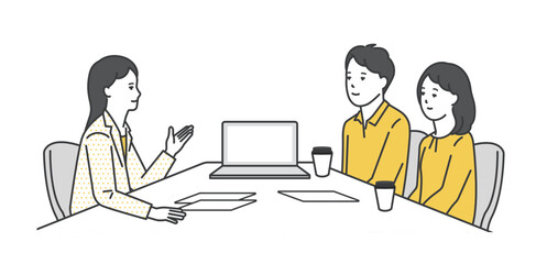 窓口でお客様の接客をするビジネスパーソン