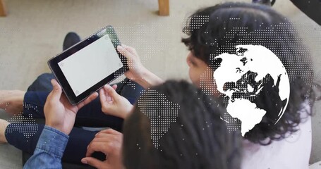 He holding tablet as she tapping corner animating rotating globe and dotted map for technology demo - Powered by Adobe