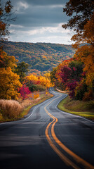 A winding road threads through vibrant fall foliage, capturing motion in stillness with warm autumn colors, serene atmosphere, and soft natural light.