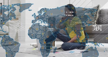 Adult woman sitting on rug, tapping phone, starting world map overlay on laptop for remote work - Powered by Adobe