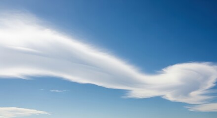 Clear Midday Blue Sky with Gently Flowing Clouds
