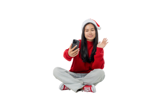 Girl smiles while video calling in winter attire, isolated, PNG - Powered by Adobe