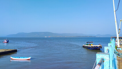 boats on the sea and beautiful view at dighi jetty in maharashtra in india.