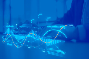 investment financial concept Business finance data analytics graph. Advisor using KPI Dashboard on virtual screen, man using computer laptop working with data charts with blue background