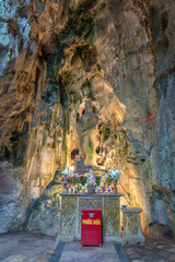 Obraz premium Buddhist pagoda in Huyen Khong cave on Marble Mountain at Da Nang city, Vietnam. Da Nang is biggest city of Middle Vietnam.