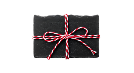 Gift - Black natural soap wrapped with red and white striped twine, minimalist skincare gift, perfect for wellness and spa promotions