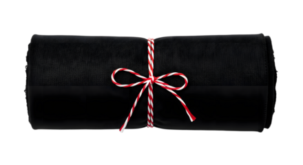 Gift - Black velvet rolled-up towel tied with red and white string on white background, spa and relaxation concept
