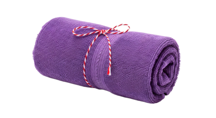 Gift - Rolled purple towel tied with red and white string on white background, perfect for spa and wellness themes