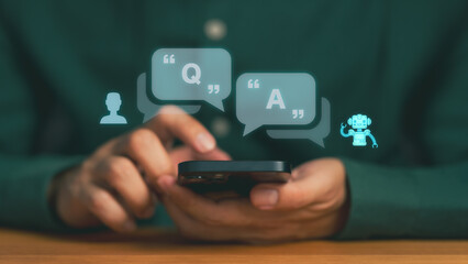 Person using smartphone with virtual chatbot for Q and A communication, representing artificial intelligence conversation, online customer support, and modern AI technology for digital interaction.