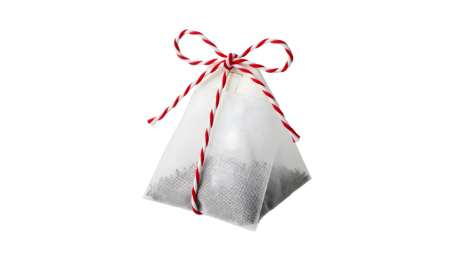 Gift - Single pyramid-shaped tea bag with red and white string bow on a white background, ideal for beverage and tea-themed projects