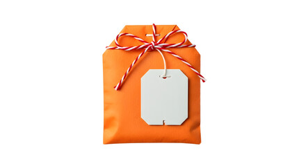Gift - Orange wrapped gift with white tag and red and white string bow isolated on white background, perfect for celebrations and presents