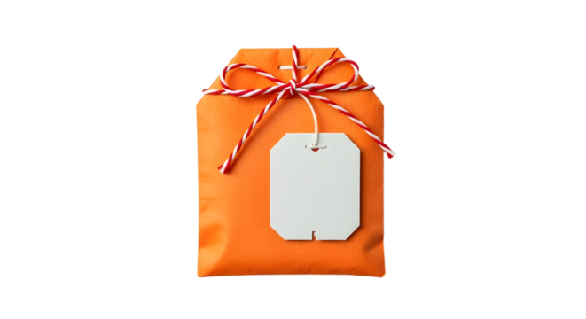 Gift - Orange wrapped gift with white tag and red and white string bow isolated on white background, perfect for celebrations and presents