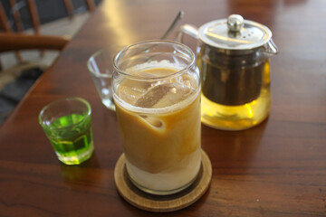 Refreshing Iced Coffee Latte and Tea Set on Wooden Table