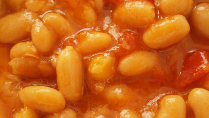 Warm baked beans with rich tomato sauce ready to enjoy