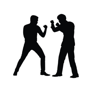 Silhouette of Two Men in Fighting Stance, Prepared for Boxing, Conflict, or Confrontation.