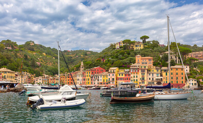 Colorful harbor with traditional boats and buildings in Portofino, Italy, Liguria region